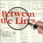 The KBCS “Between the Lines” logo features bold red text that reads “Between the Lines,” partially overlaid by a magnifying glass, symbolizing the show’s focus on deep exploration of news topics.