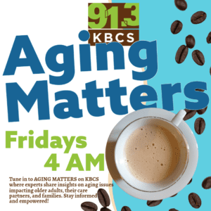 The attached image is a flyer for the 91.3 KBCS radio program Aging Matters. The design prominently features the show’s title, “Aging Matters,” in bold blue and green lettering, with the KBCS logo above it. The background includes coffee beans scattered around the edges, along with a steaming cup of coffee in the bottom-right corner. It invites listeners to tune in on Fridays at 4 AM. Below this, there is additional text that highlights the program’s focus on aging issues, offering insights from experts that aim to inform and empower older adults, caregivers, and families.