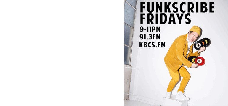 Funkscribe holding multiple 7 inch records. DJ wearing yellow ski hat, pants and jacket