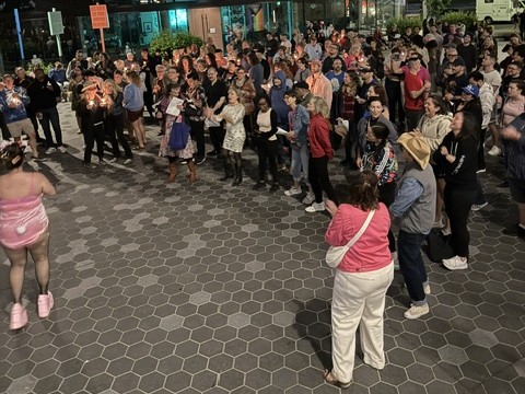 Some of the crowd at a vigil for Dolly Parton on Friday, August 28 at the AIDS Memorial Pathway on Capitol Hill in Seattle.